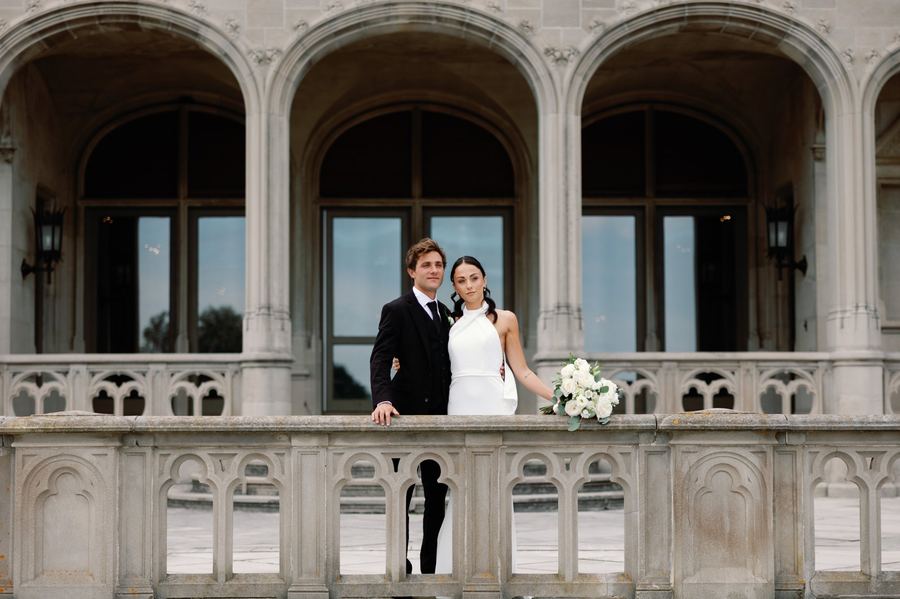 Couple on mansion balcony